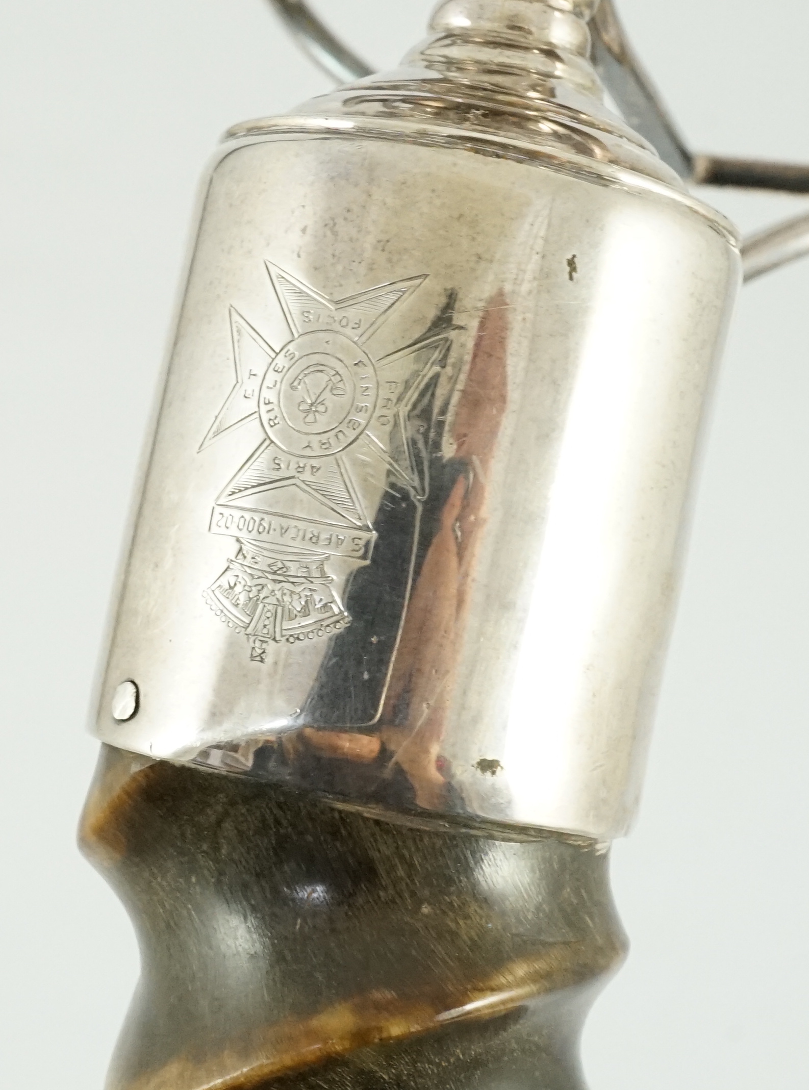 The Finsbury Rifles. An Edwardian silver and antler horn gimballed table lighter, retailed by Asprey & Co, London, 1907